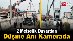 Otomobilin Panelvana Çarpıp 2 Metrelik Duvardan Düşme Anı Kamerada