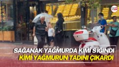 Sağanak yağmurda kimi sığındı kimi yağmurun tadını çıkardı